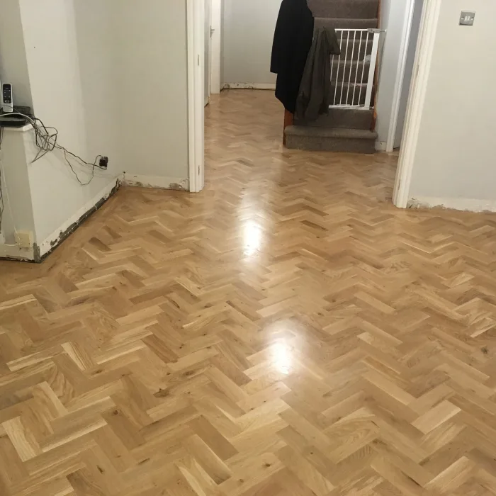 A restored wood floor in a Wigan home