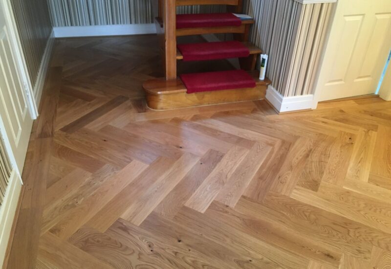 Oak herringbone with a curved stair