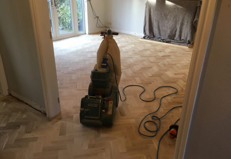 Dust-controlled sanding in progress