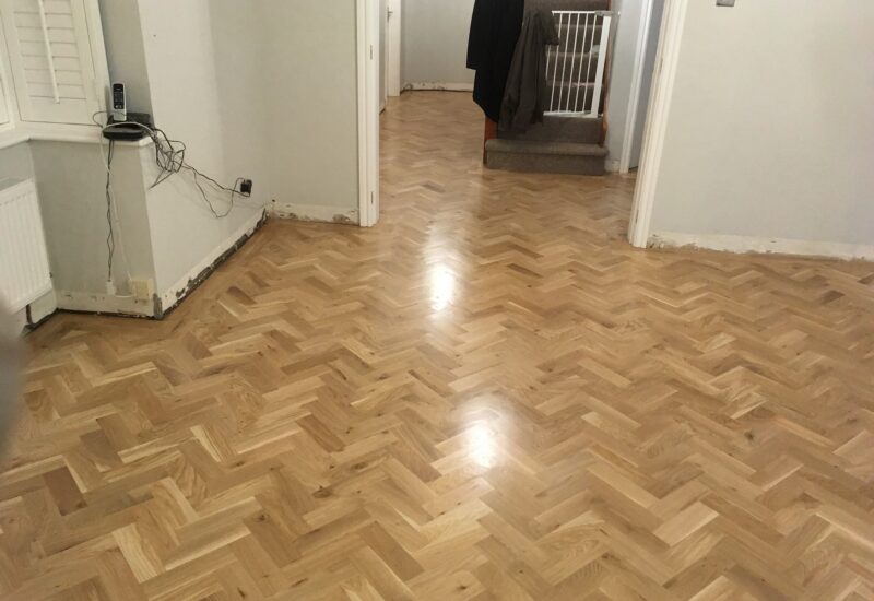 Restored parquet through the hallway