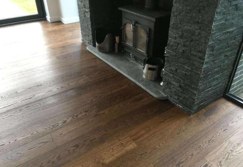 Engineered oak around a log burner